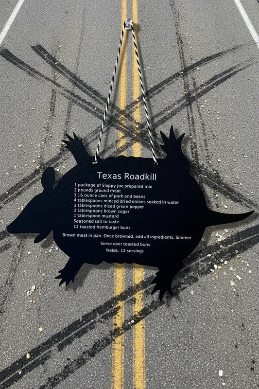 A wall plaque shaped like a Texas roadkill Armadillo Hamburger Recipe.